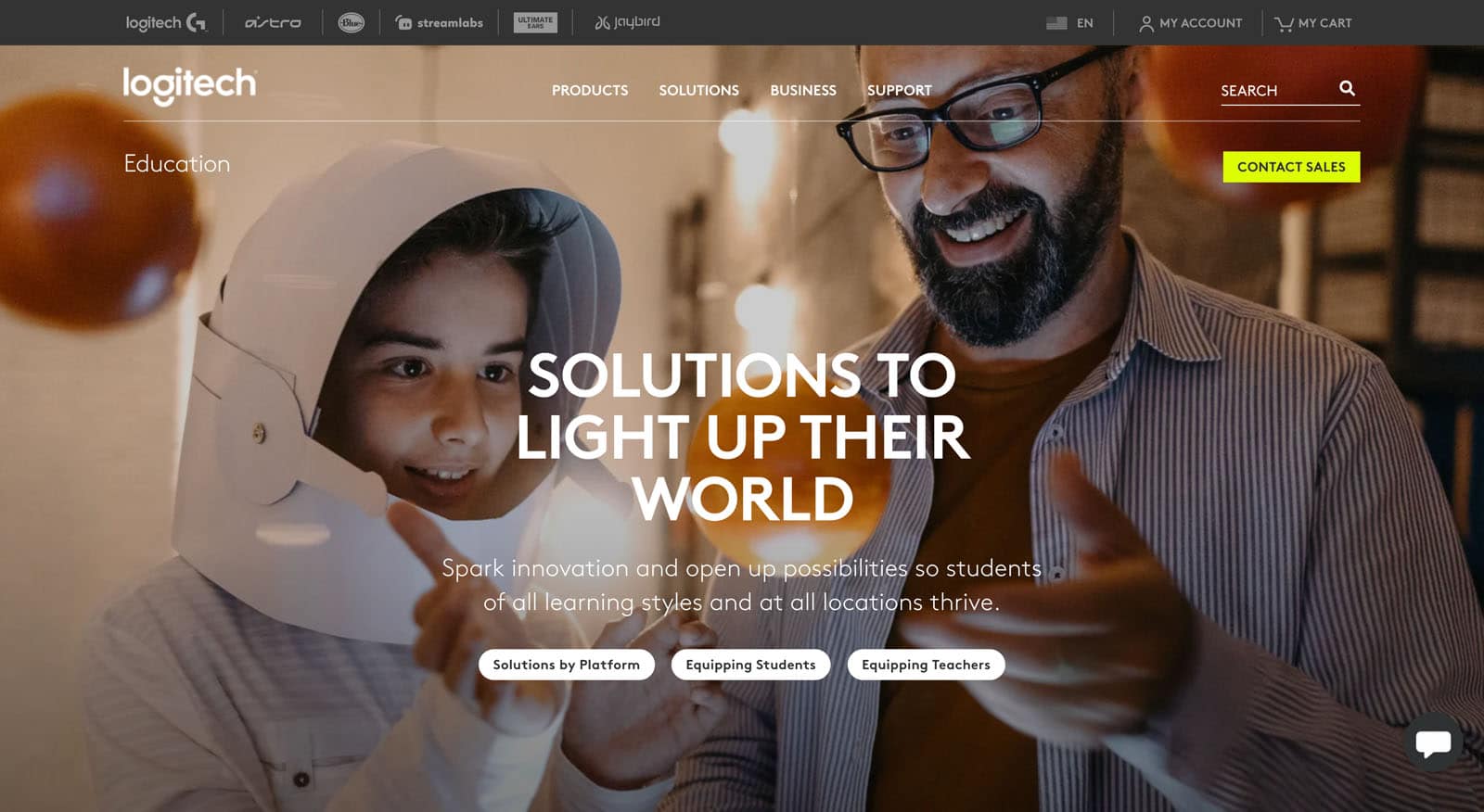 Screenshot of the educational section on Logitech's site. A teacher and a student take center stage, with the copy Solutions to light up their world.